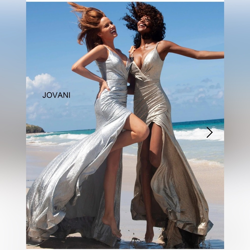 Jovani Gown. Originally $600 NWT. Never Worn. Size 0. Color Sand (muted gold)